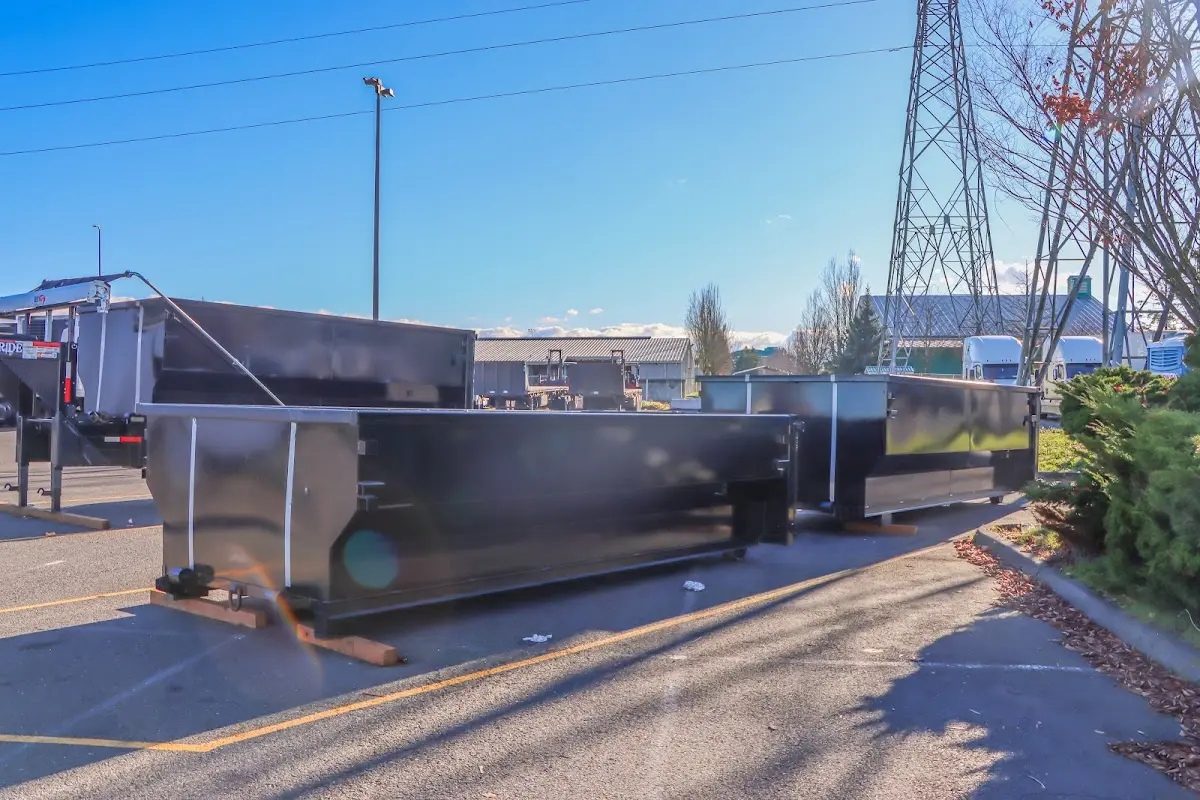 Roll-off dumpster ready for waste disposal at job site for Demolition Dumpster Rental in Rock Springs